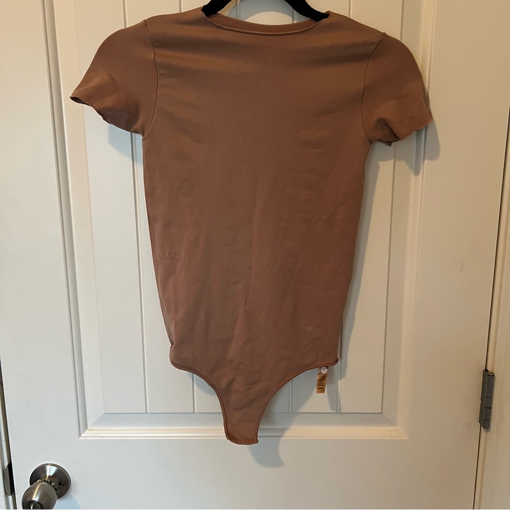 Skims body suit.